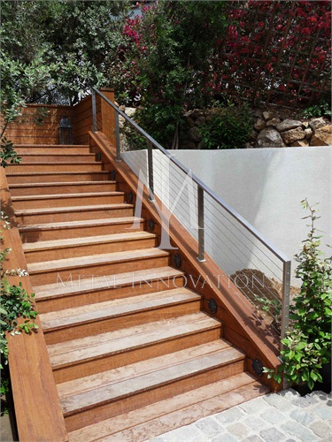 <p>This a stainless steel cable rail that is surface mounted at a home on Sea Lane Drive in Malibu. The rails are fabricated with 1″x 2″ rectangle top rail and rectangle vertical posts for a more streamline look.</p>
